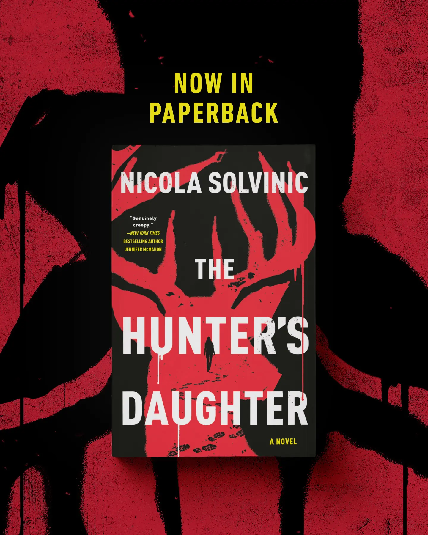 Book with dripping upside-down deer in background