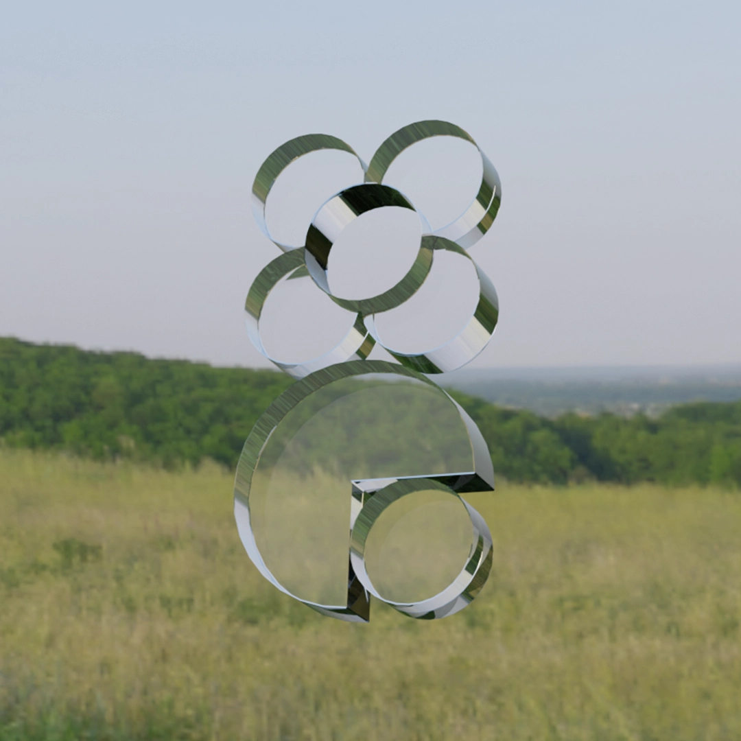 3D glass transparent logo in front of grass hill